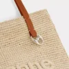 Beige raffia-taske med logo
