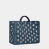 Denimblå totebag i raffia