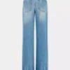 Flared jeans pyntet med 1969-skiver