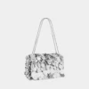 Glitrende baguette-taske