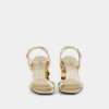 Guldfarvede sandaler med Sparkle-hæl
