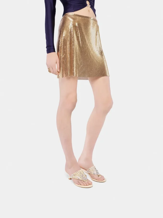Guldfarvet miniskirt i mesh