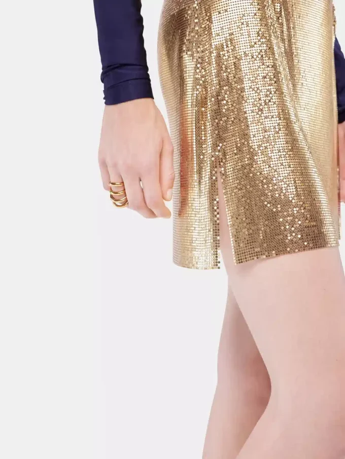 Guldfarvet miniskirt i mesh