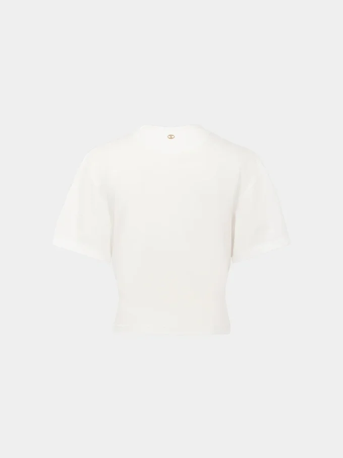 Hvid T-shirt med piercing