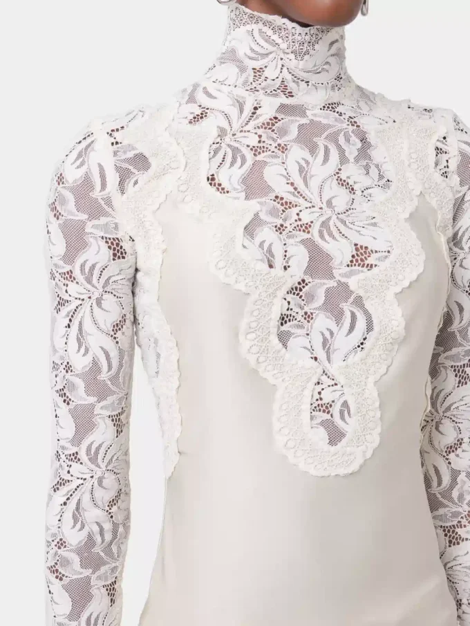 Langærmet top i elfenbenfarvet blonder og jersey