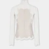 Langærmet top i elfenbenfarvet blonder og jersey