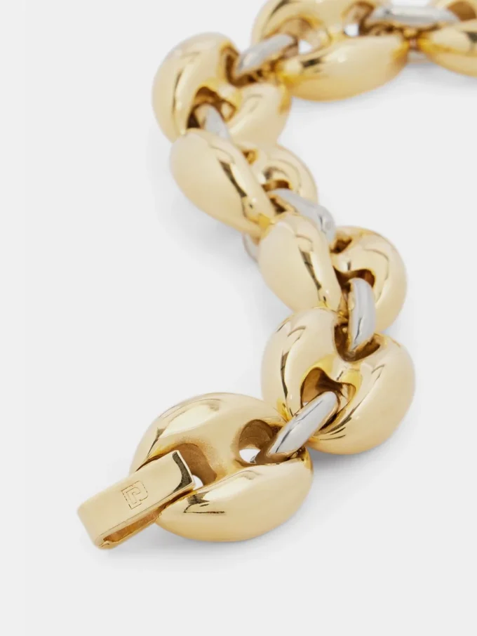 Otte tykke tofarvede armbånd