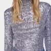 Rullekravebluse i pailletter