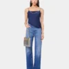 Signaturjeans med 1969 metalskiver