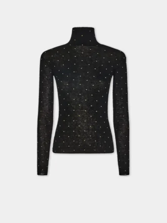 Turtleneck-top i uld, der sidder som et ekstra lag hud