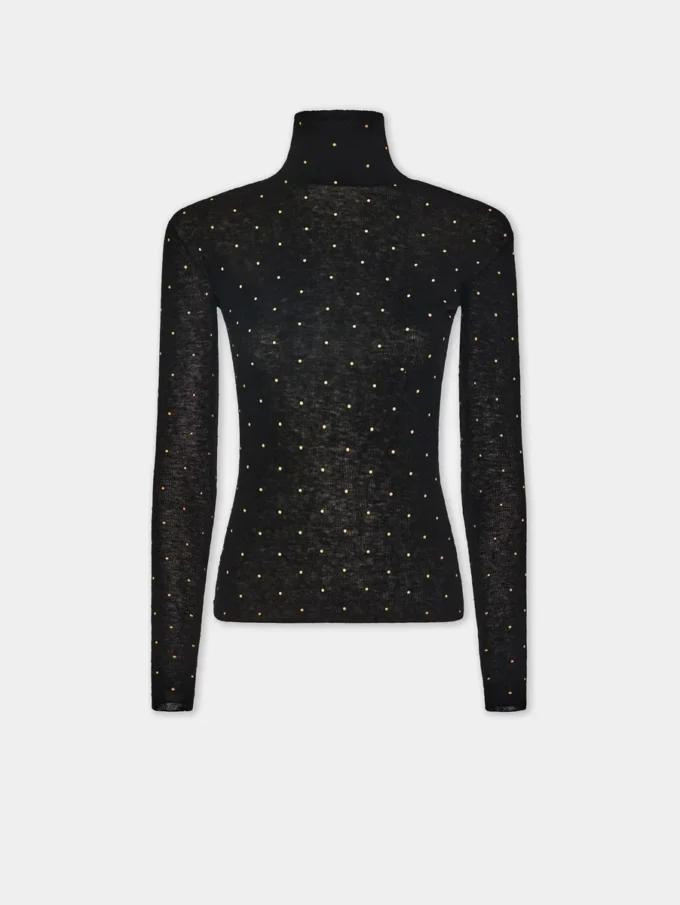 Turtleneck-top i uld, der sidder som et ekstra lag hud