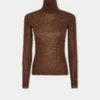 Turtleneck-top i uld, der sidder som et ekstra lag hud