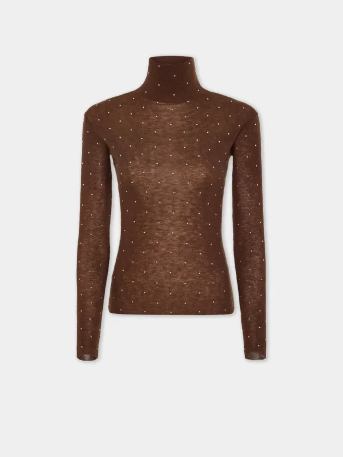 Turtleneck-top i uld, der sidder som et ekstra lag hud