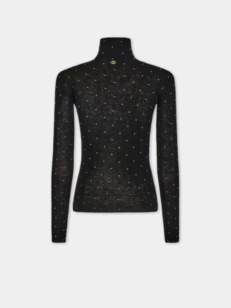 Turtleneck-top i uld, der sidder som et ekstra lag hud