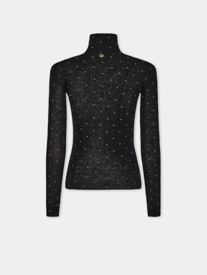 Turtleneck-top i uld, der sidder som et ekstra lag hud