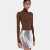 Turtleneck-top i uld, der sidder som et ekstra lag hud