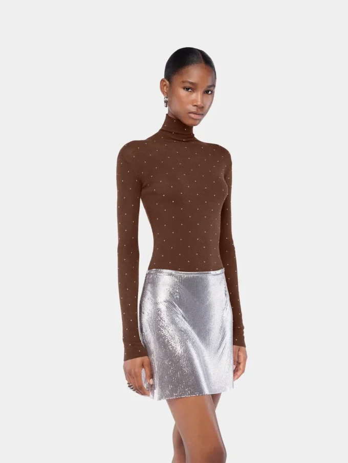 Turtleneck-top i uld, der sidder som et ekstra lag hud