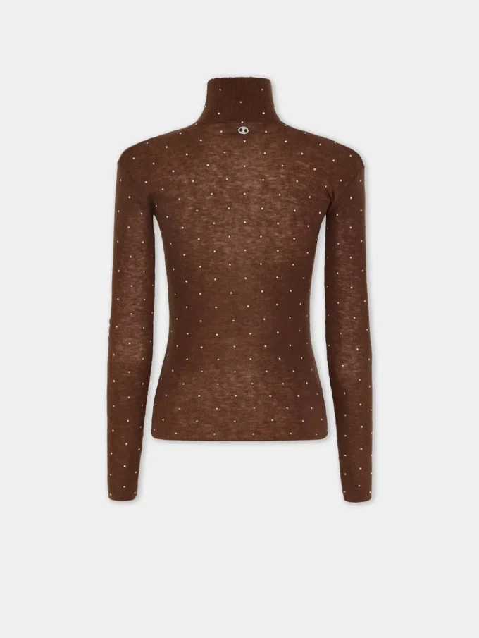 Turtleneck-top i uld, der sidder som et ekstra lag hud